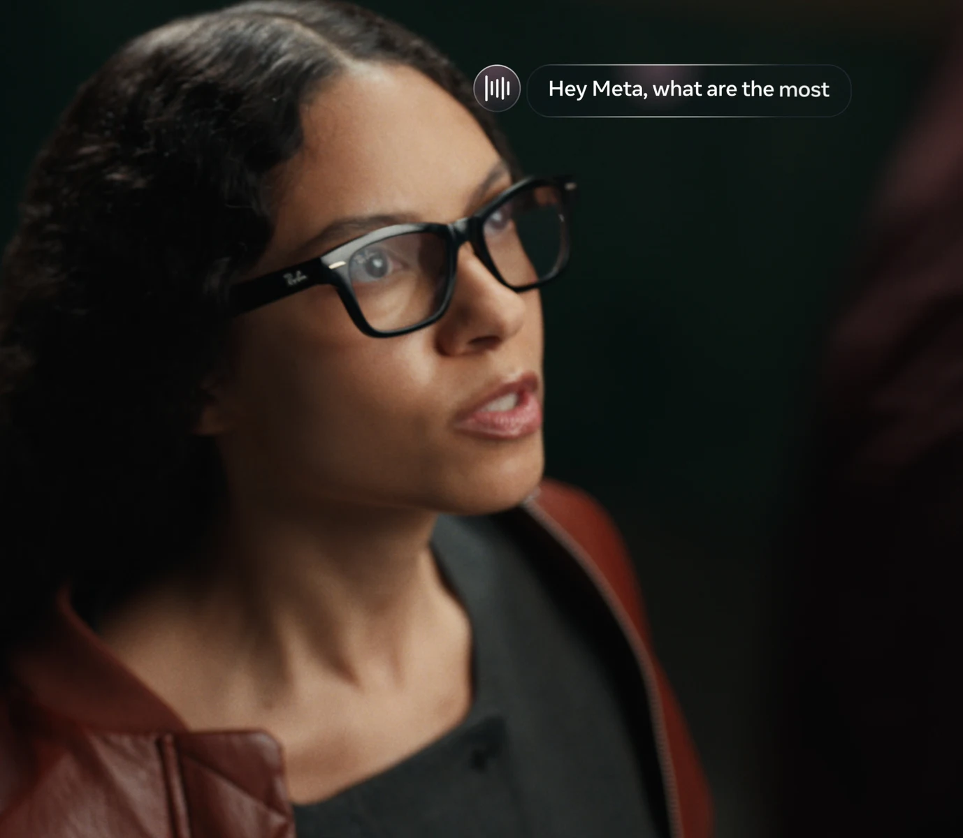 A woman using Ray-Ban Meta Audio glasses with a voice-command overlay.
